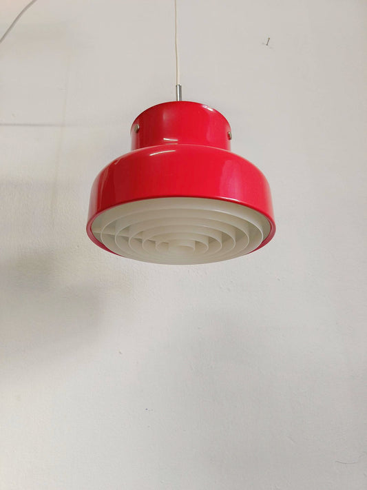 Vista frontale lampada Bumling cilindrica due livelli metallo laccato rosso brillante